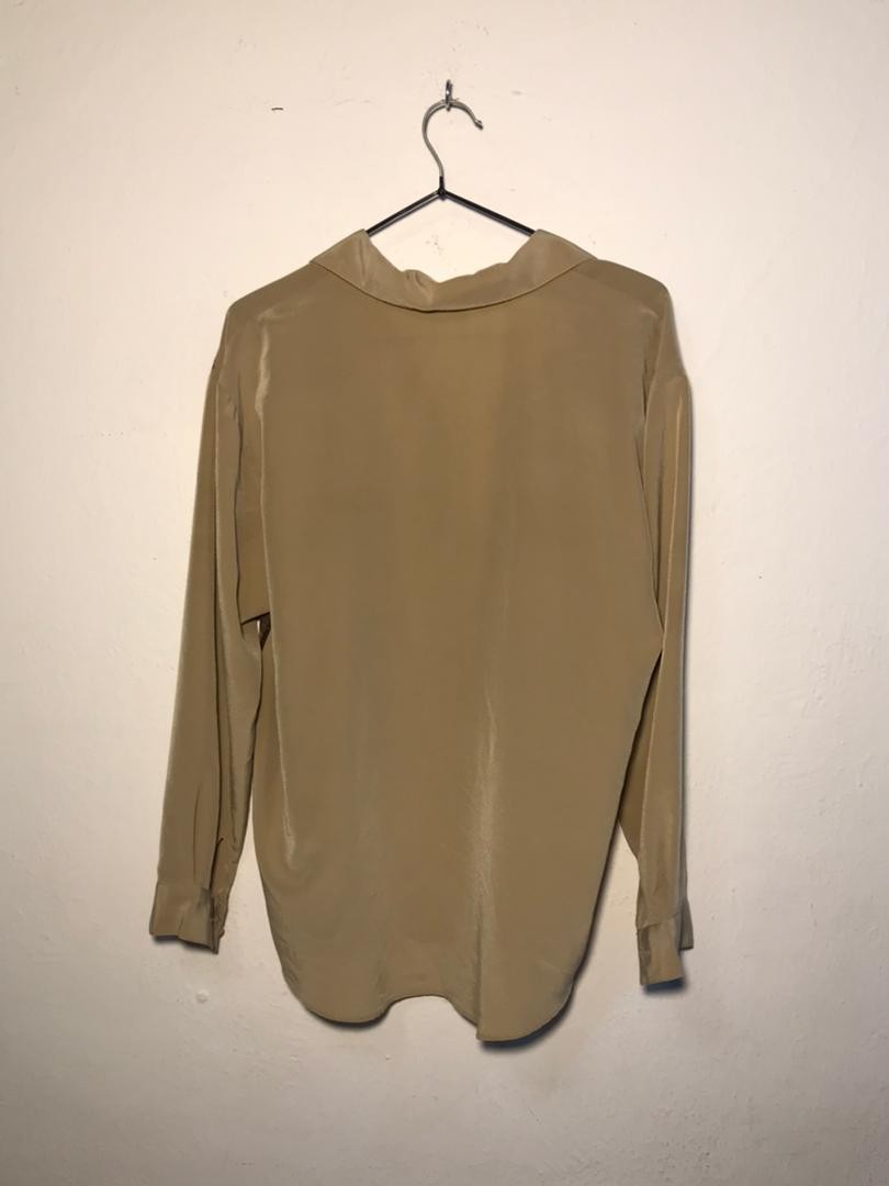 SPIRAL STORE beige long-sleeve collared shirt with button cuffs and a relaxed fit.