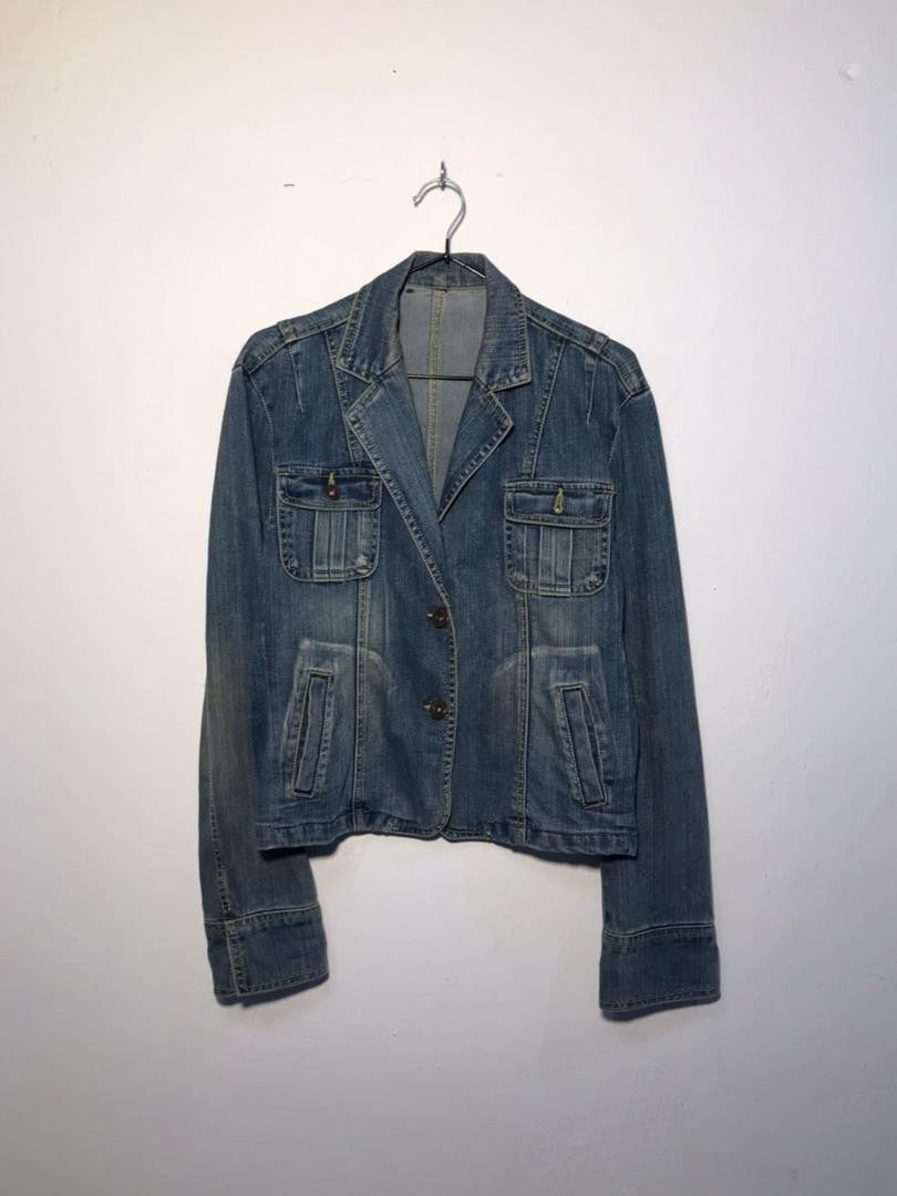 SPIRAL STORE blue denim jacket with button closure, chest pockets, and structured collar.