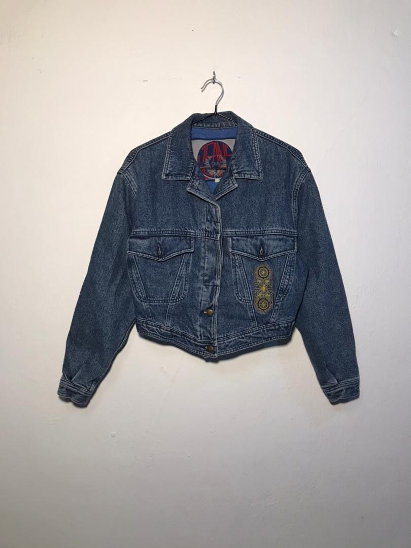SPIRAL STORE blue denim jacket with embroidered detail on chest pocket and collar.