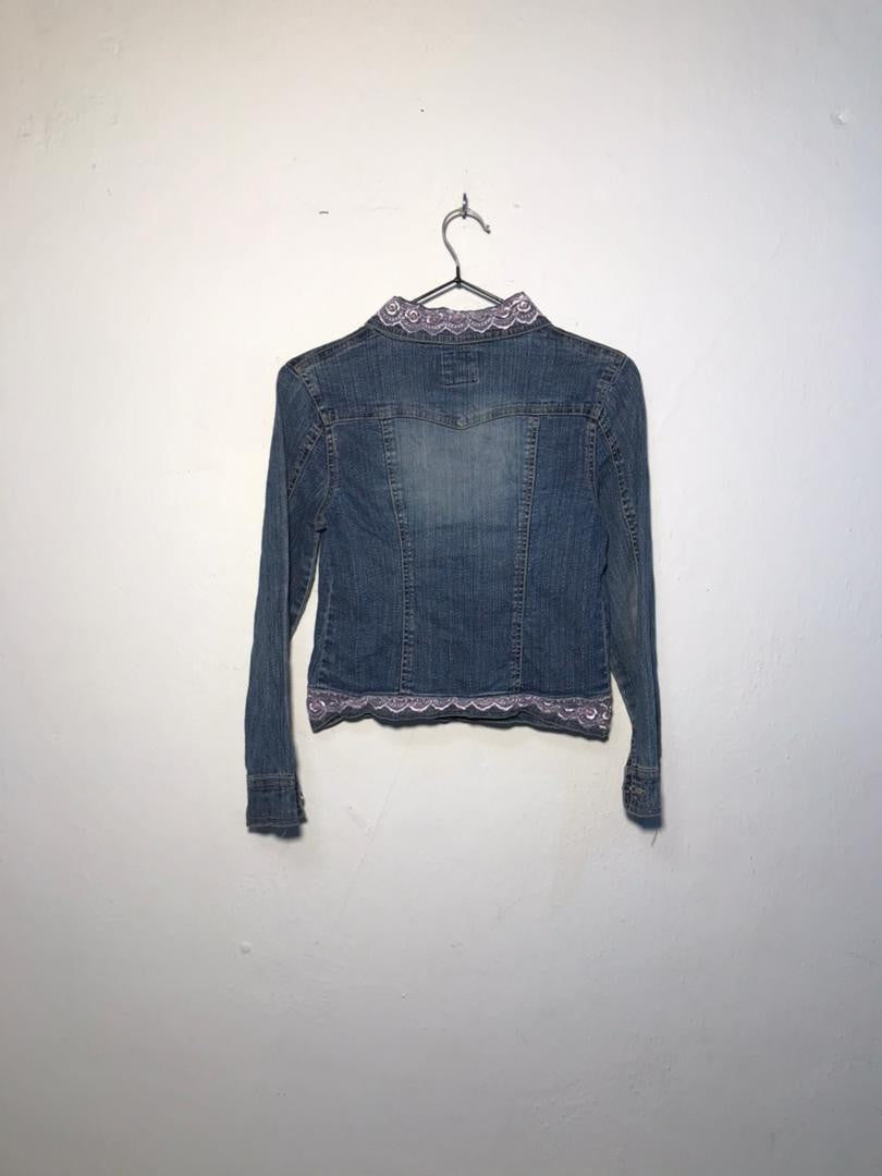 SPIRAL STORE blue denim jacket with lace trim on collar and hem. Button-up front, long sleeves.