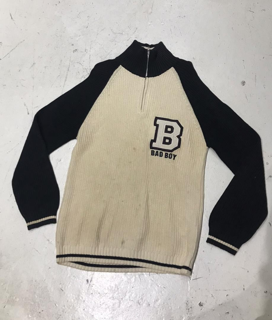 SPIRAL STORE cream and black knit sweater with "B BAD BOY" graphic and quarter zip.