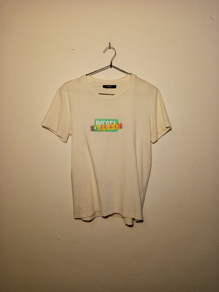 SPIRAL STORE cream cotton t-shirt with colorful DIESEL graphic print on chest, short sleeves.