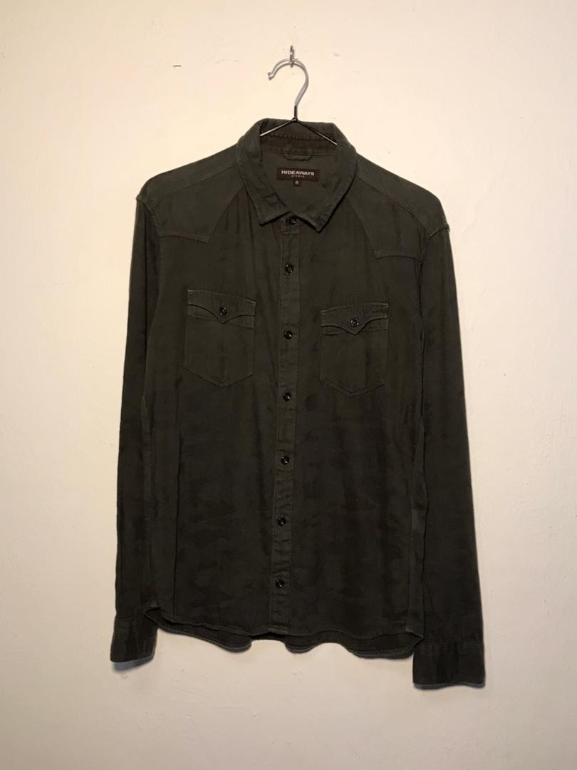 SPIRAL STORE dark green long sleeve button-up shirt with two chest pockets and a spread collar.