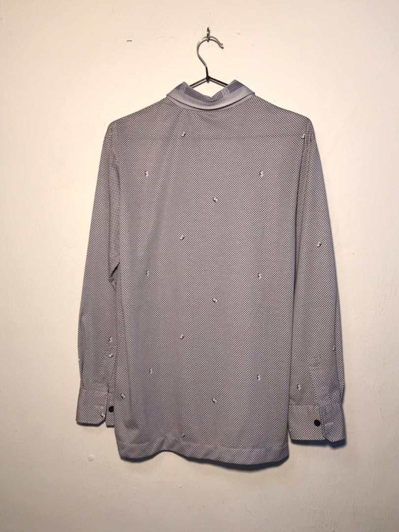 SPIRAL STORE men's grey long-sleeve button-up shirt with all-over dollar sign pattern and black cuffs.