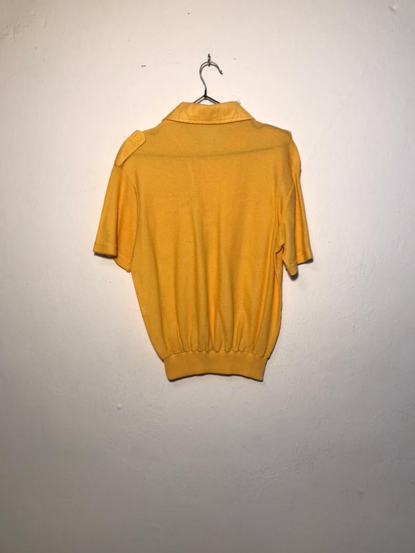 SPIRAL STORE yellow short-sleeve polo shirt with collar and shoulder button detail